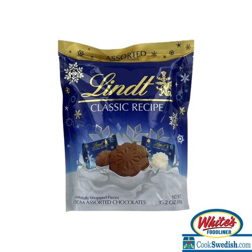 Lindt Classic Recipe Assorted Chocolate Snowflakes – Holiday Bag (Milk & White Chocolate)